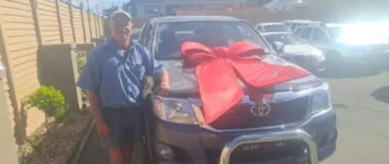 Tracey Roux collecting their vehicle